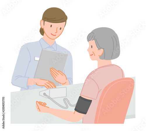 Senior woman blood pressure measurement with nurse at clinic