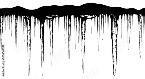 Photos Black icicles hanging from a dark ledge on a white background creating a dramati