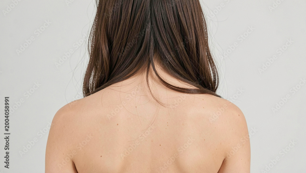 Fototapeta premium Close-up image of bare shoulders with visible shoulder blades.