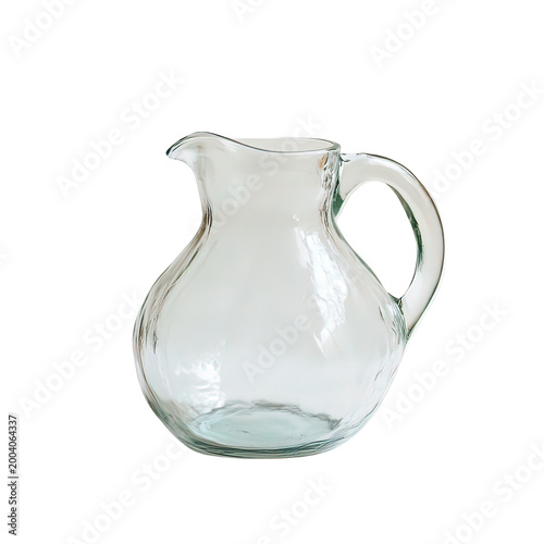 Clear glass pitcher with handle.