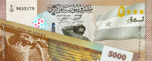 Canvas Print Front side of the Syrian 5000 Pounds banknote featuring a soldier saluting and the national flag of Syria
