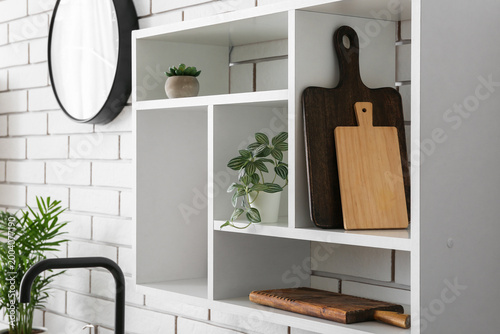 Shelf with wooden cutting b...