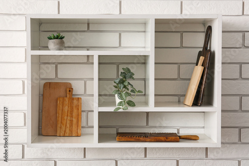 Shelf with wooden cutting b...