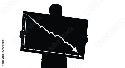 Silhouette of a person holding a large board showing a downward trend in business performance