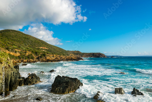 Obraz na płótnie Sunny panoramic view of Masua beach with turquoise sea on west coast of Sardinia