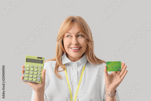 Female bank manager with ca...