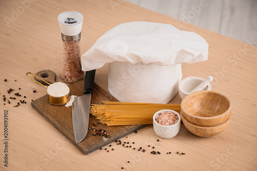 Chef's hat, pasta and seaso...