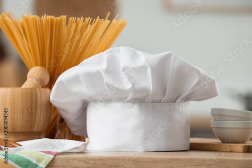 Chef's hat, pasta and utens...