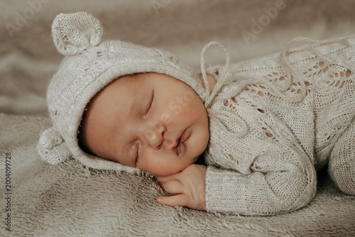 newborn baby sleeping on its tummy, healthy baby sleep, sleeping newborn