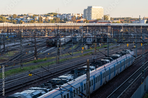 Stockholm Sweden commute rides the transit network as train railway tracks form transport infrastructure lines shaping the city rail system