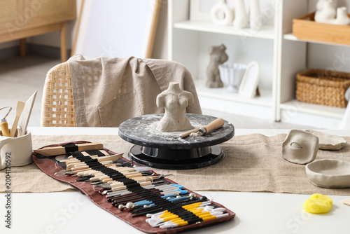 Sculptor's workplace with c...