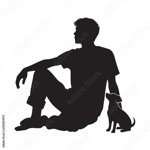 Silhouette of a Young Man Sitting on the Ground With His Small Puppy.