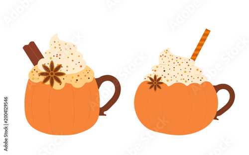 Two pumpkin shaped mugs filled with spiced latte and topped with whipped cream star anise and cinnamon