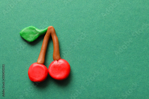 Cute cherries made of plast...