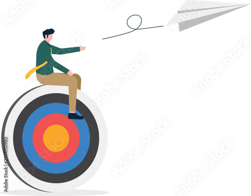 Professional on giant target throwing paper plane