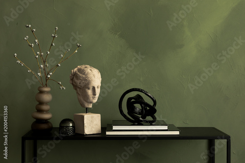 Photos Stylish arrangement with modern decor, bust sculpture, willow branches, and deco