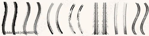 Collection of various black tire track marks. Grunge vehicle tread patterns isolated on white background