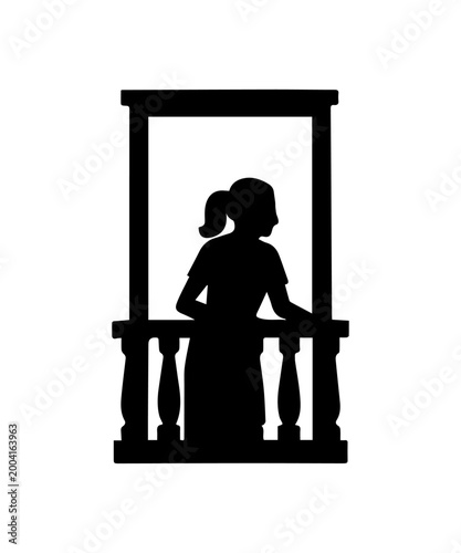 Silhouette of a woman with her hair in a ponytail standing on a balcony