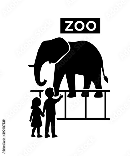 Children watching elephant silhouette at zoo enclosure