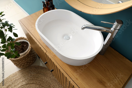 Ceramic sink on commode in ...