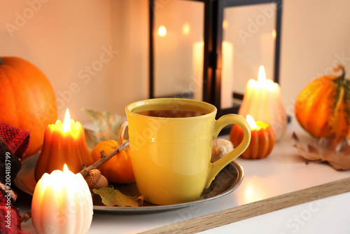 Cup of green tea, candles, ...
