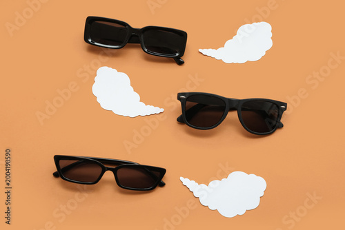 Stylish black sunglasses wi...