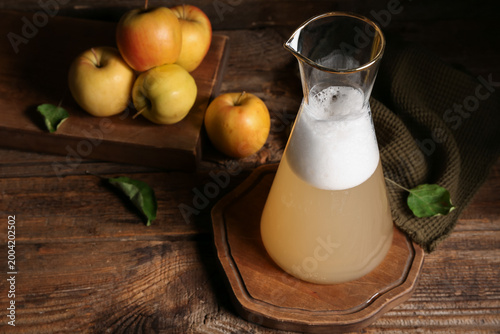Jug of fresh apple kvass an...