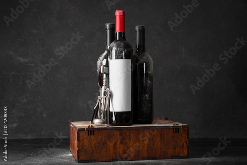 Box with bottles of wine an...