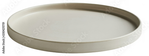 Simple round ceramic plate in light beige color isolated on a clean white background, for dining