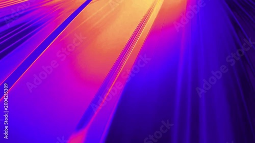 Abstract blue background with diagonal lines fading into vibrant orange stripes in smooth motion.