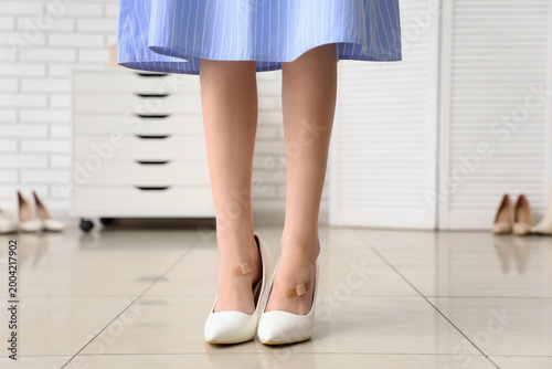 Legs of young woman in high...