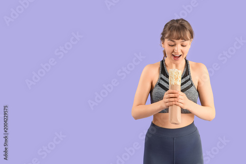 Sporty young woman with don...
