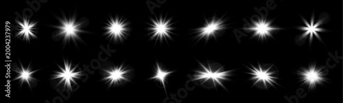 Foto Soft white shimmer floats in darkness