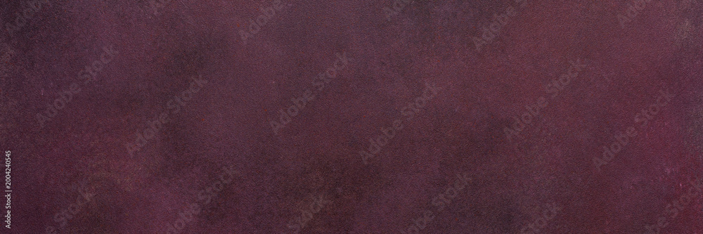 Fototapeta premium A dark maroon surface exhibits a subtle texture. Light and dark variations create a smooth, blended effect over the entire area, banner