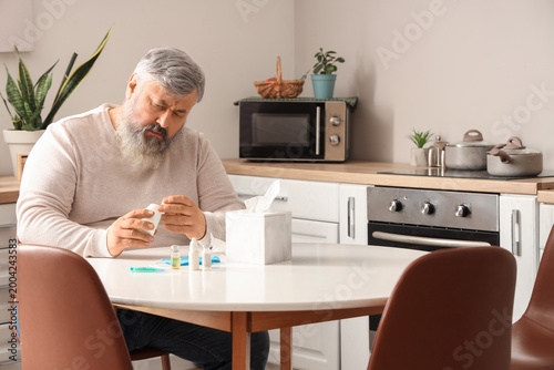Portrait of sad senior man ...