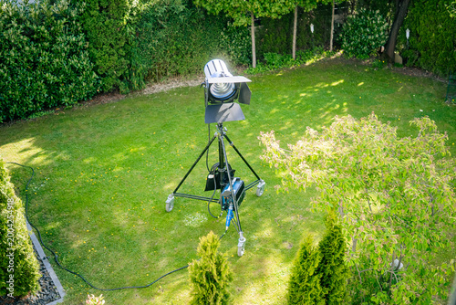 Fotografie Professional cinema Fresnel light with barn doors on heavy-duty tripod stand set