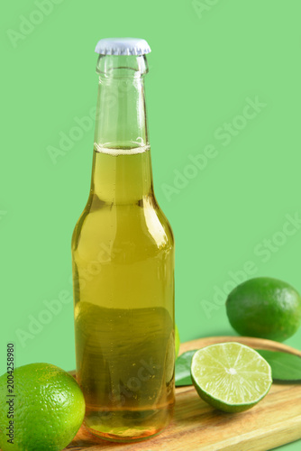 Bottle of cold beer with li...