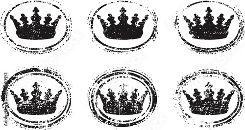 Grunge crown stamps set vintage royal emblem silhouettes with distressed texture for design and decoration