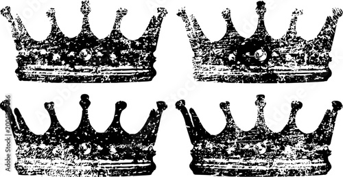 Set of four vintage distressed black crowns with classic ornate design and textured effect