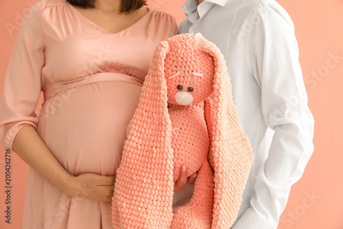 Young pregnant couple with ...