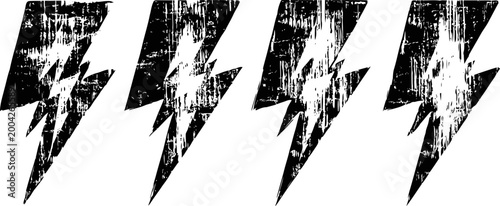 Set of four distressed black lightning bolt icons with grunge texture and rough edges