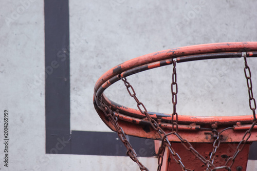 Vászonkép Detailed close up of a weathered basketball hoop rim with a durable chain net ag