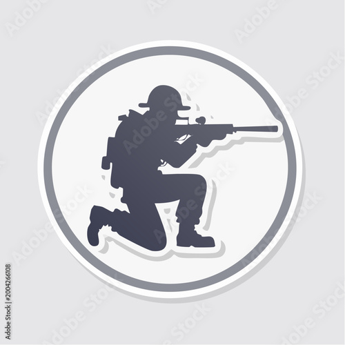 Silhouette of a Soldier Aiming a Rifle