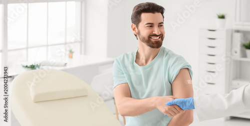 Young man with applied medi...