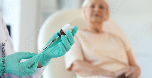 Female doctor with vaccine ...