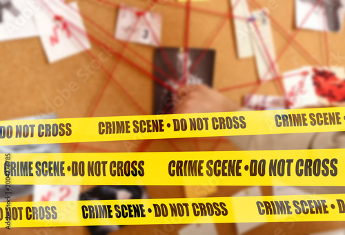 Detective near crime board ...