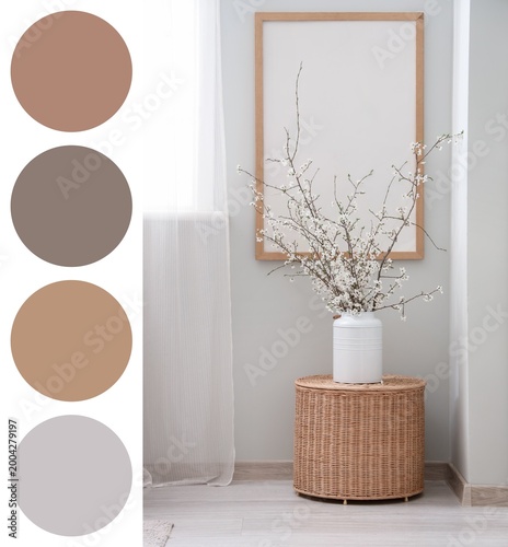 Vase with blossoming tree b...