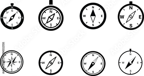 Collection of eight black and white compass icons isolated