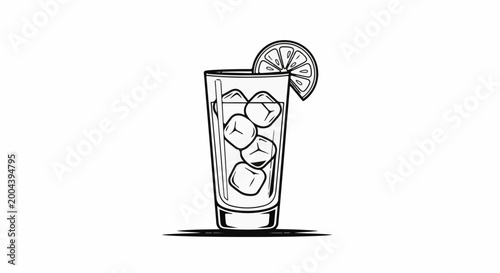 Tall glass of iced beverage with lemon slice and straw