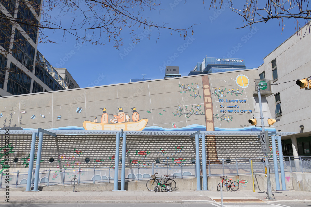 Fototapeta premium exterior building with mural by Darwin Peters and sign of St. Lawrence Community Recreation Centre, Yorktown On The Park, 230 The Esplanade, Toronto